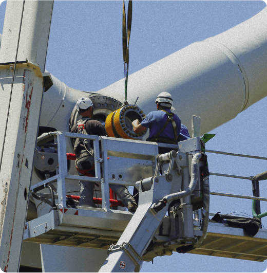Workers working on the maintenance of a wind turbine